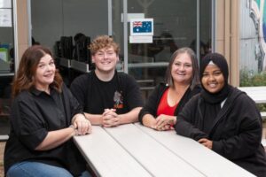 Werribee Community College teacher Yolanda Berecz (left) and Assistant Principal Teresa Vizintin (second from right) with students Connor and Dalia. (Jacob Pattison)392916_02